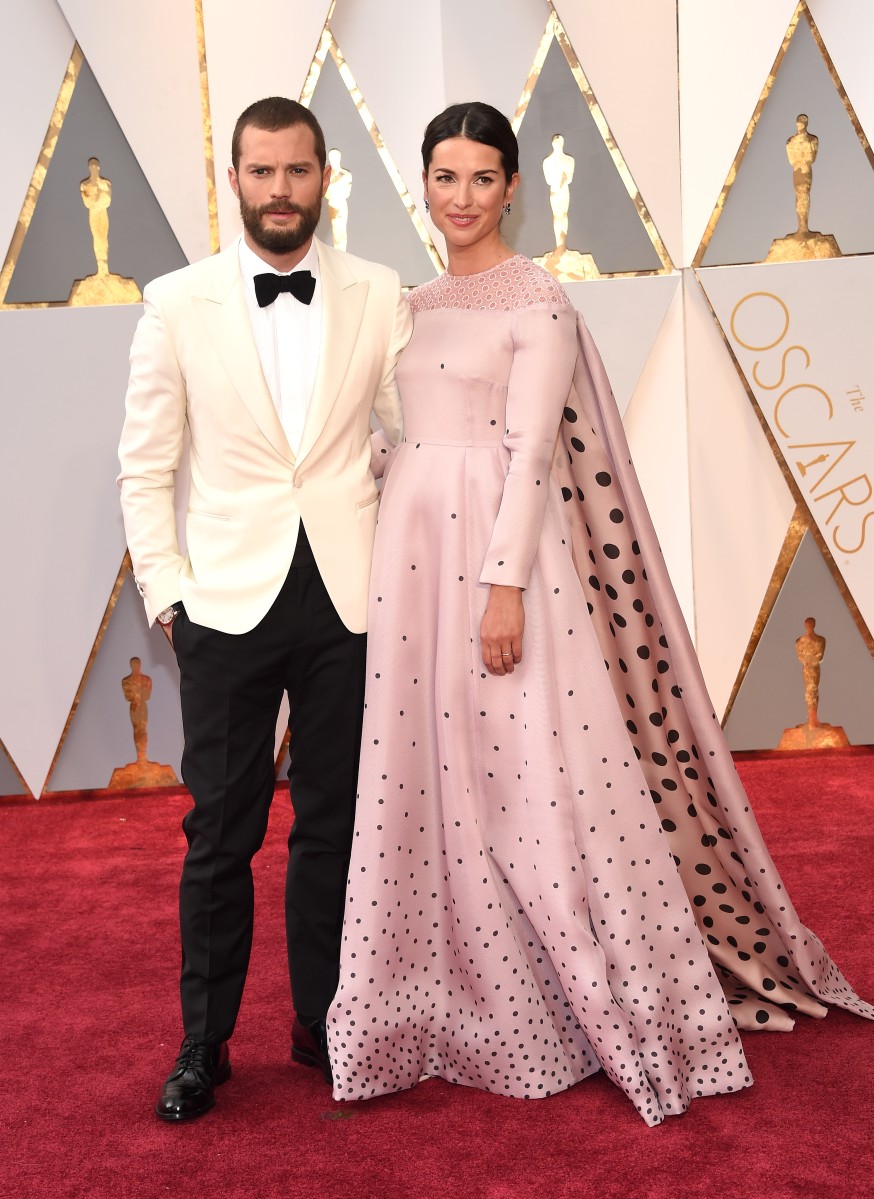 Джейми Дорнан с супругой.