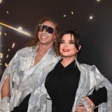 Муж Королевой предстал в новом образе на фоне своей картины